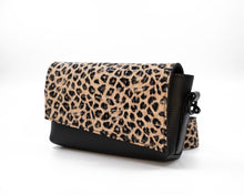 Load image into Gallery viewer, Leopard print handbag with black accents on a white background