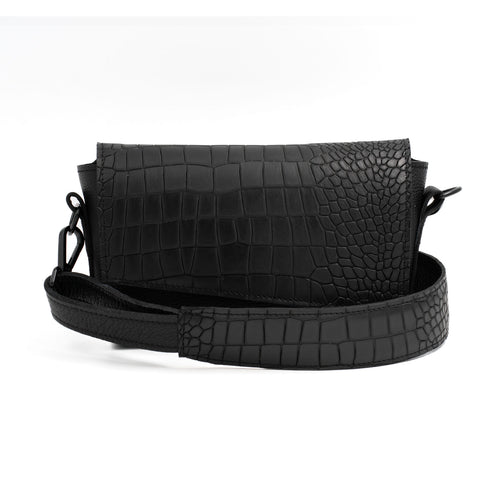 A black leather crossbody bag with a textured surface and an adjustable strap, displayed in an open position to show the interior compartment.