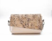 Load image into Gallery viewer, Crossbody bag with snake print top half and beige bottom half on a white background
